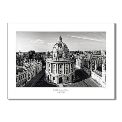 Black-and-white art print of the Radcliffe Camera viewed from St Mary’s Church tower, showcasing its iconic dome, classical architecture, and the surrounding historic streets and spires of Oxford