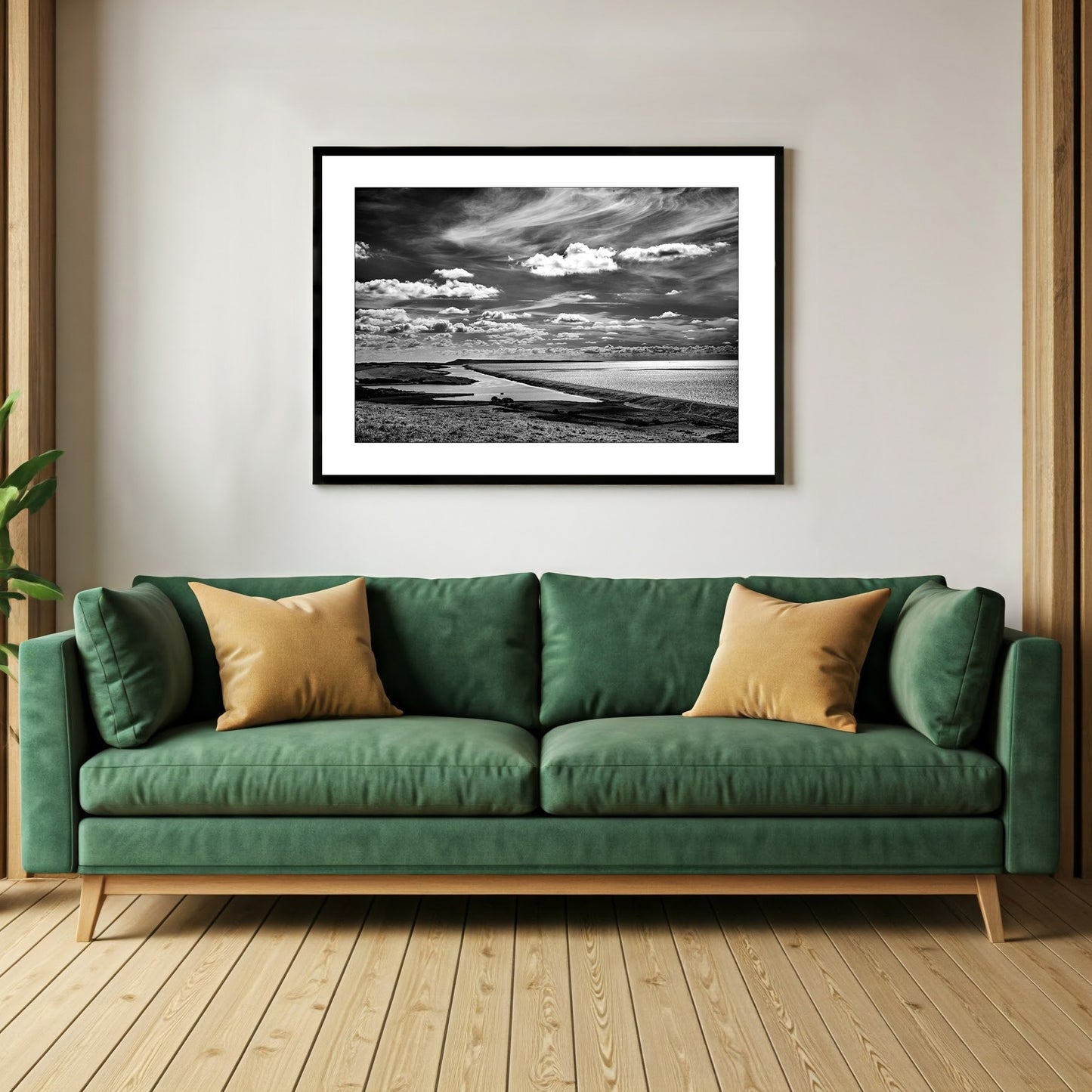 Dramatic black and white landscape wall art photographic print of Chesil Beach, Dorset, showcasing the vast expanse of shingle and the interplay of light and shadow