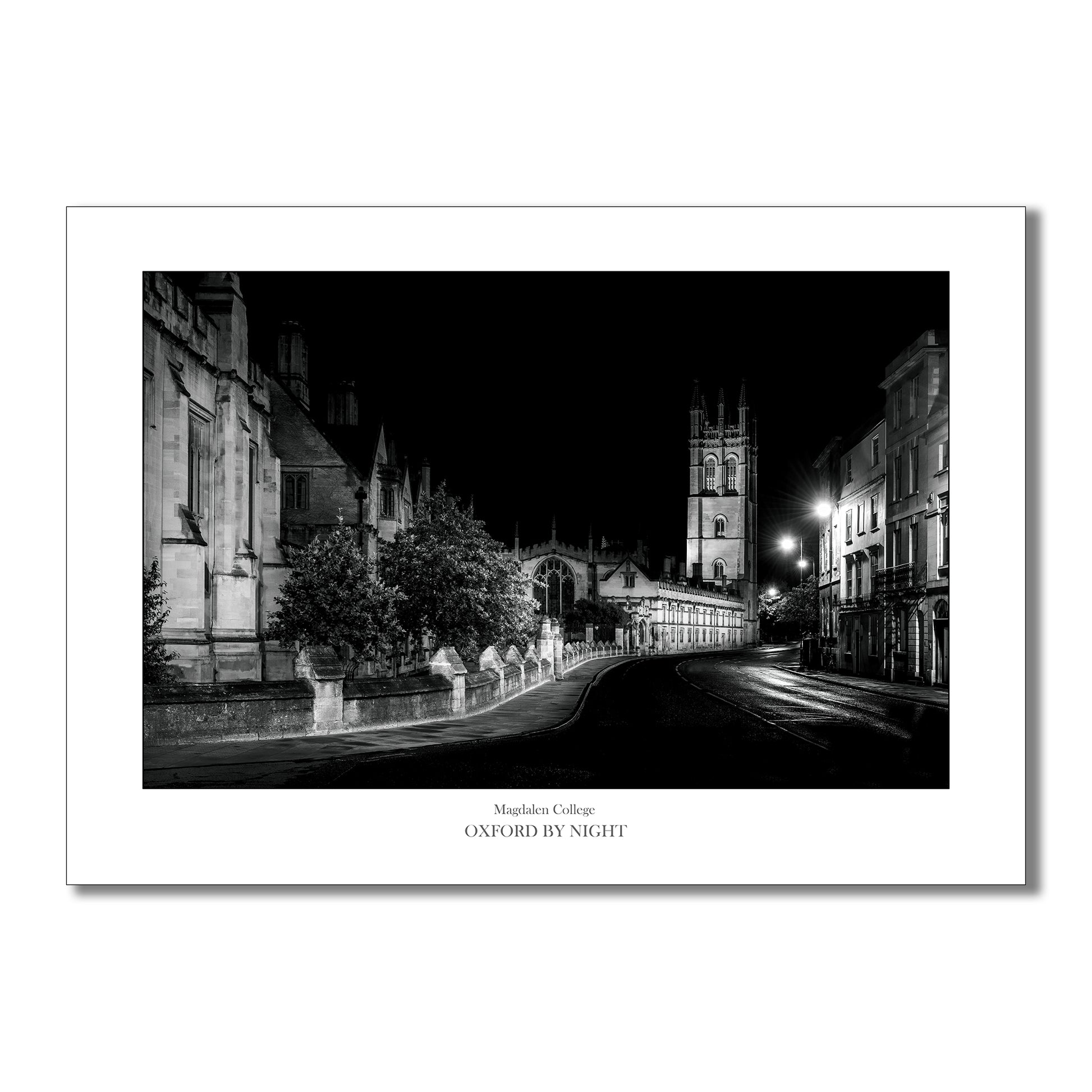 Exclusive B&W art print showcasing Magdalen College Tower in Oxford under the cover of darkness as seen from High Street. A mesmerizing black and white image highlighting the architectural details of this historic Oxford college.