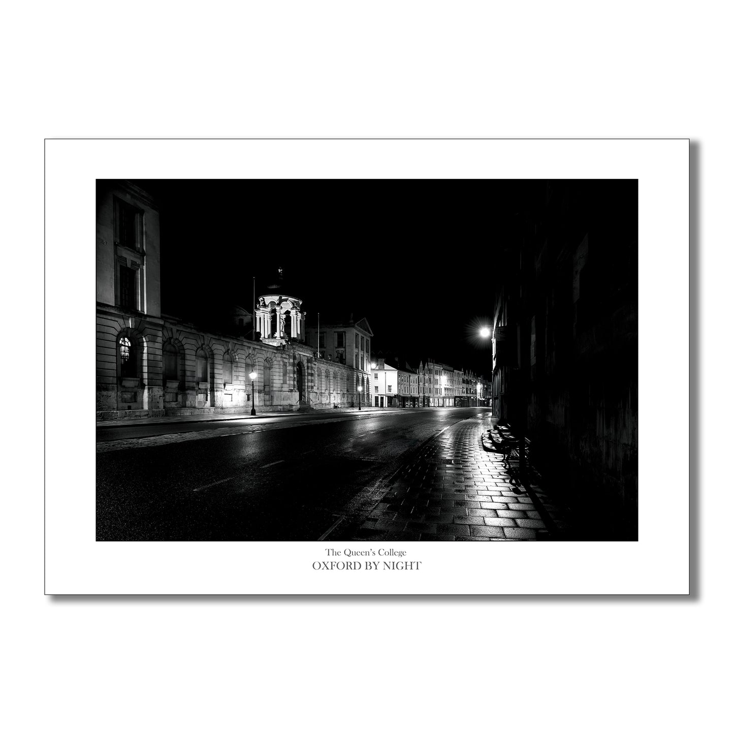 Black and white art print of Queen's College, Oxford, standing majestically along the empty High Street at night