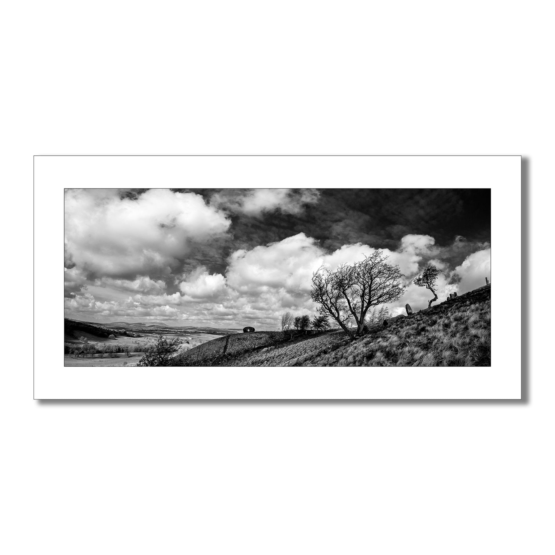 Discover the haunting beauty of 'The Atom Panopticon' with this striking black and white art print. This historic Lancashire landmark is captured in a dramatic landscape setting.